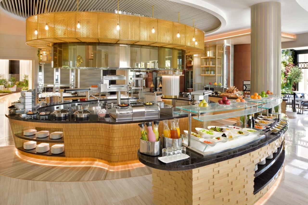 Moevenpick Hotel Bahrain Muharraq Extérieur photo The Open Kitchen