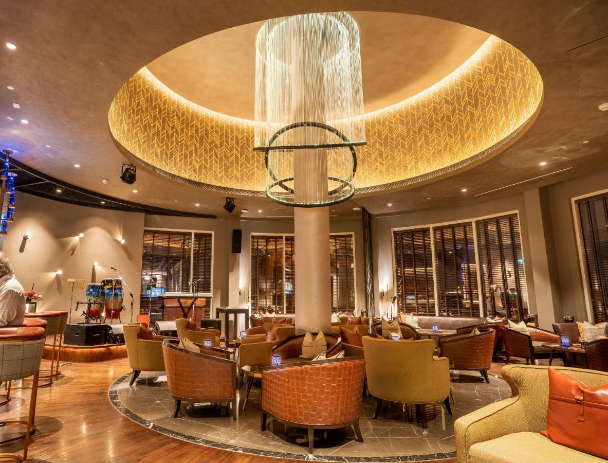 Moevenpick Hotel Bahrain Muharraq Extérieur photo The interior of the restaurant